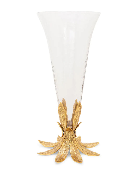 Glass vase on gold flower base